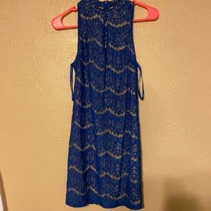 Blue lace dress tan under